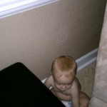 hiding behind the couch 6-27-2010 2-25-00 PM