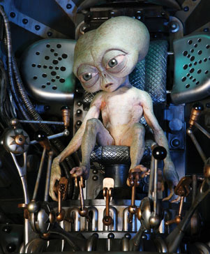 men-in-black-alien second shot of the little alien controlling the human from Men in Black