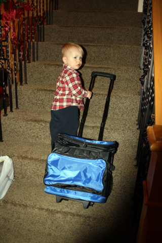 pulling his new bag 12-26-2010 7-37-08 PM