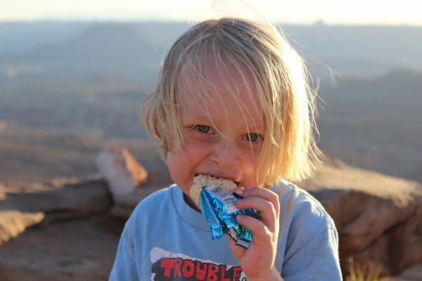 Toren waiting for the sunset, enjoying a rice krispy treat.