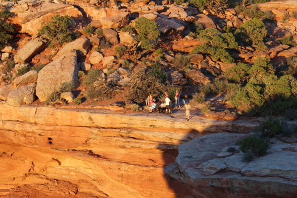 The rest of the family at their vantage point - on the edge of thousand foot cliff.