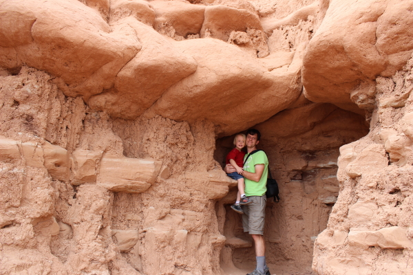Ryan and Toren exploring a cave.