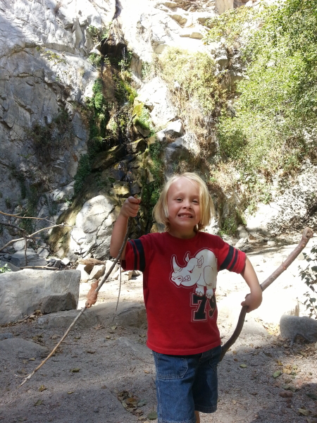 Toren with his gun sticks that he collects everywhere.