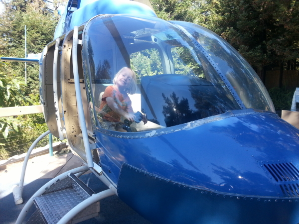 Toren flying a helicopter.