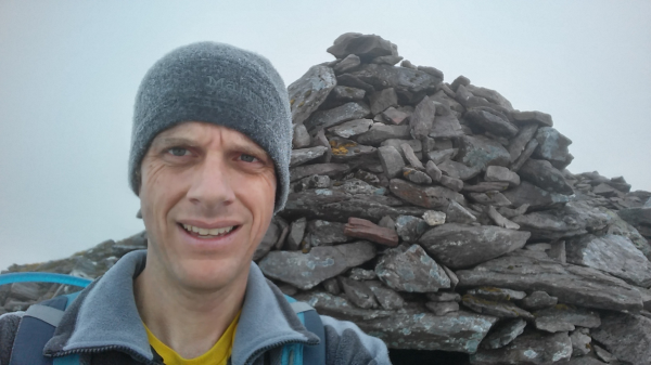 Me at the Caher summit with condensation on my hat.