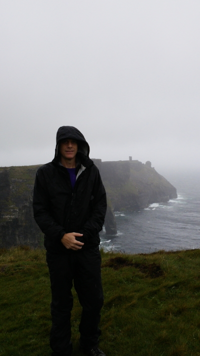 Me nearing Moher Tower on Hag's Head in the not yet terrible weather.