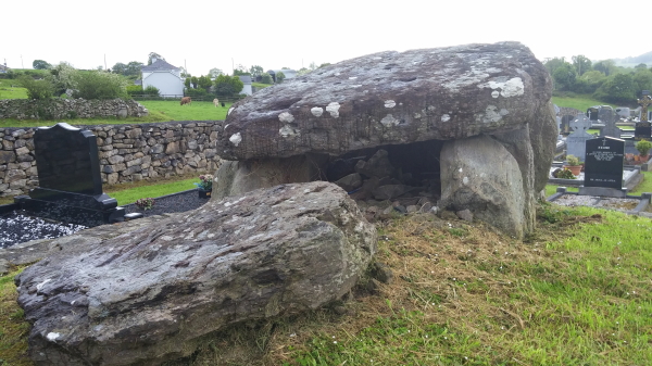 The passage tomb in Craughaun Cemetery.