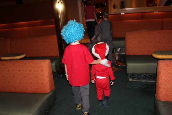 Toren walking with his cousin Zach out of the Suessapalooza show.