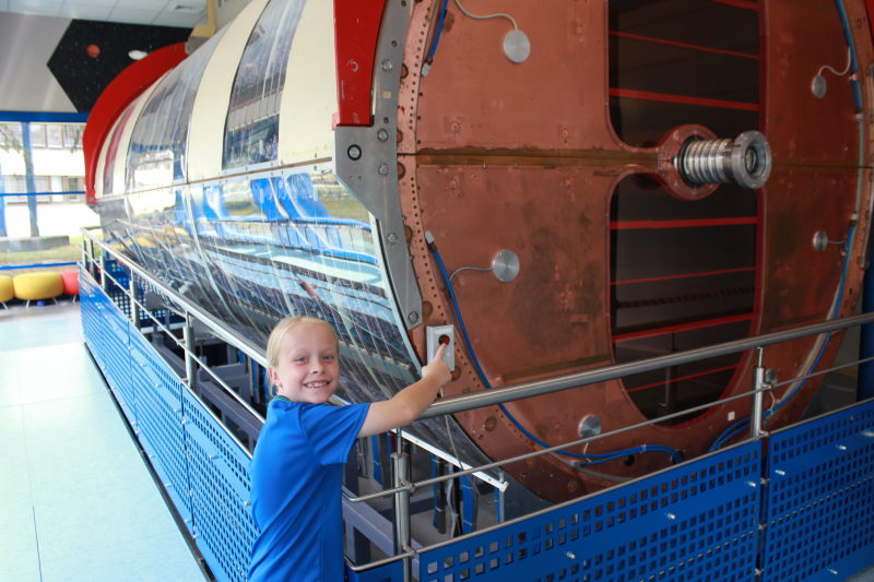 Toren pushing the "self-destruct" button on an old collider. It was a red button with no label, so I told him it was the self-destruct button and he immediately proceeded to push it.