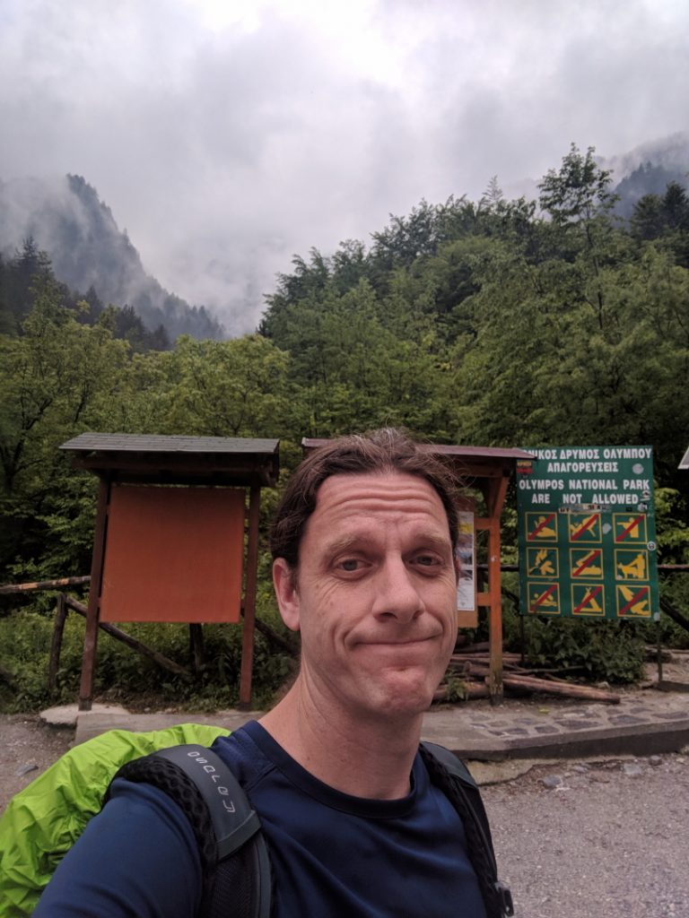 Me at the trailhead just after the rain stopped.