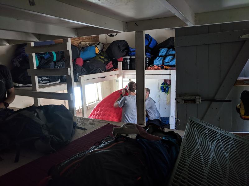 We stayed in a wooden hut with shelves for bunks the first night at Camp Muir.